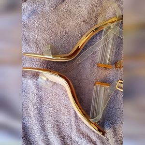 Women's size 8 Fashion Nova Heels. Rose gold and clear plastic.